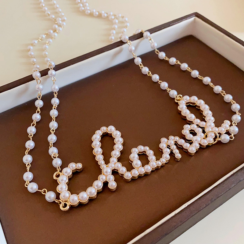 Cuentas de arroz de dopamina perla collar de cuentas cilíndricas temperamento de moda nicho Cadena de clavícula personalidad collar de todo fósforo para las mujeres