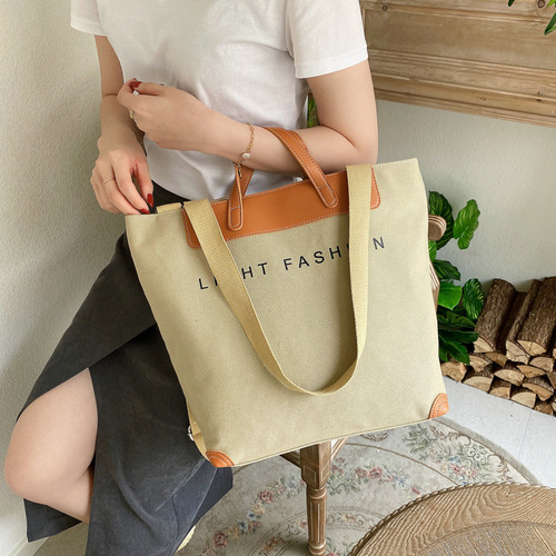 Canvas bag new style women's bag large capacity Korean style fashion shoulder crossbody bag handheld tote bag bag delivery