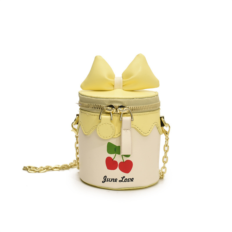 Bolso de cubo lindo japonés 2025 primavera y verano nuevo bolso femenino lindo lazo bolso de hombro mini cadena bolso de mensajero