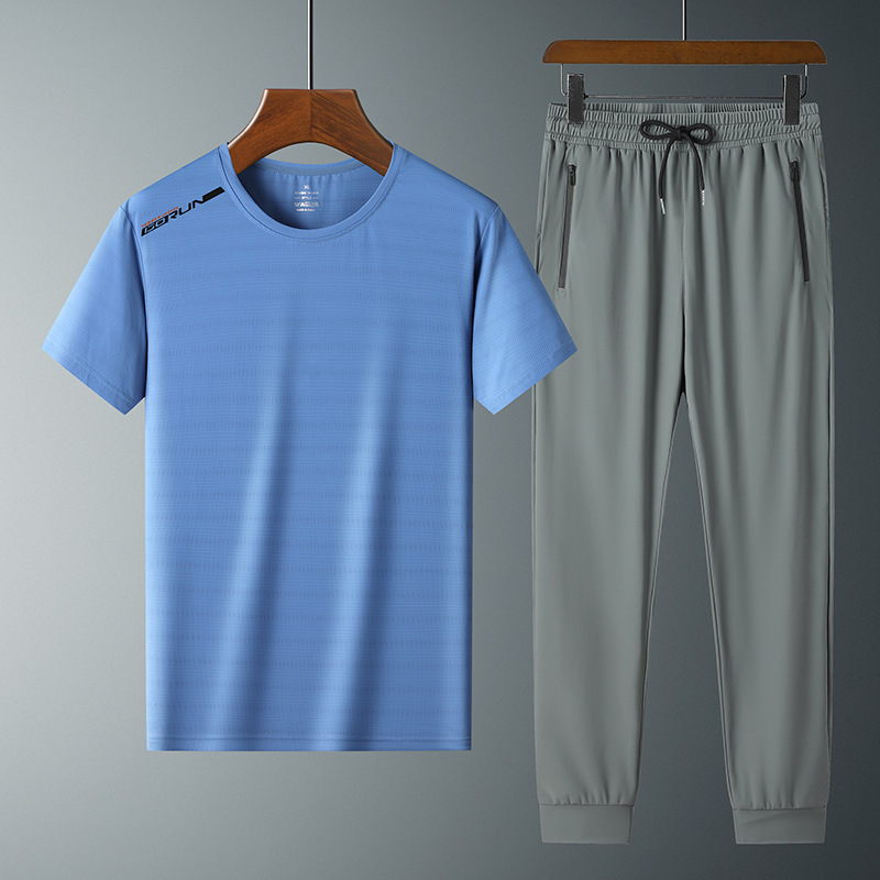 Moda pantalones de seda de hielo cuello redondo Camiseta de dos piezas para hombres talla grande suelta de secado rápido traje deportivo LOGO se puede formular