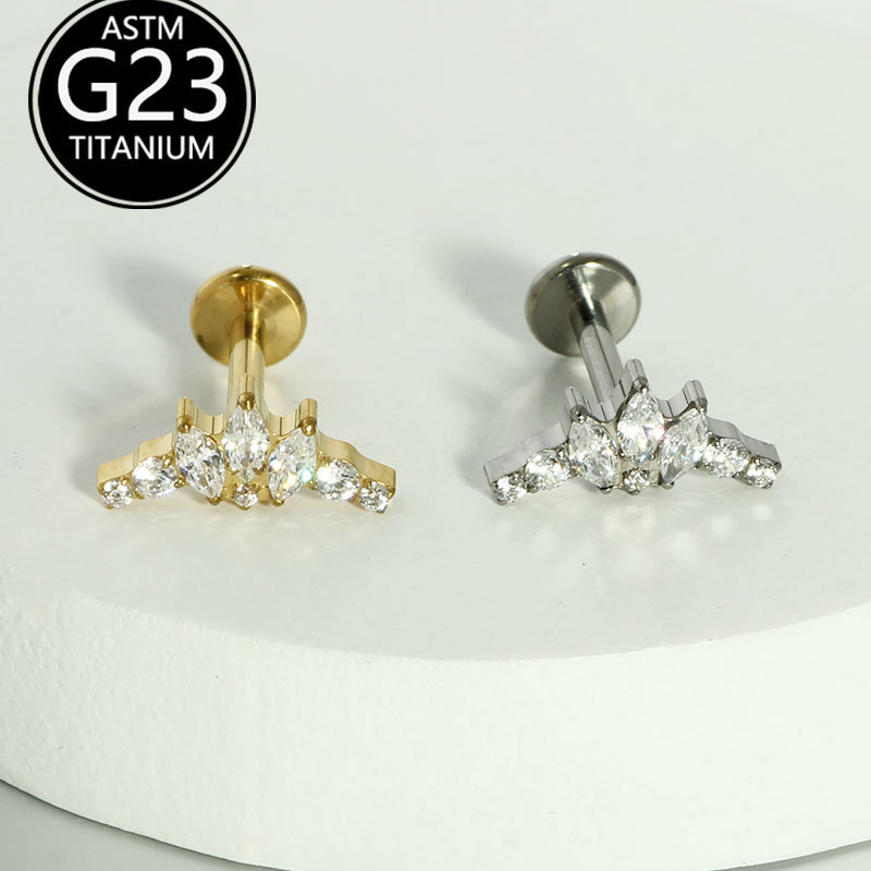 Silver pointed spike labret stud material detail