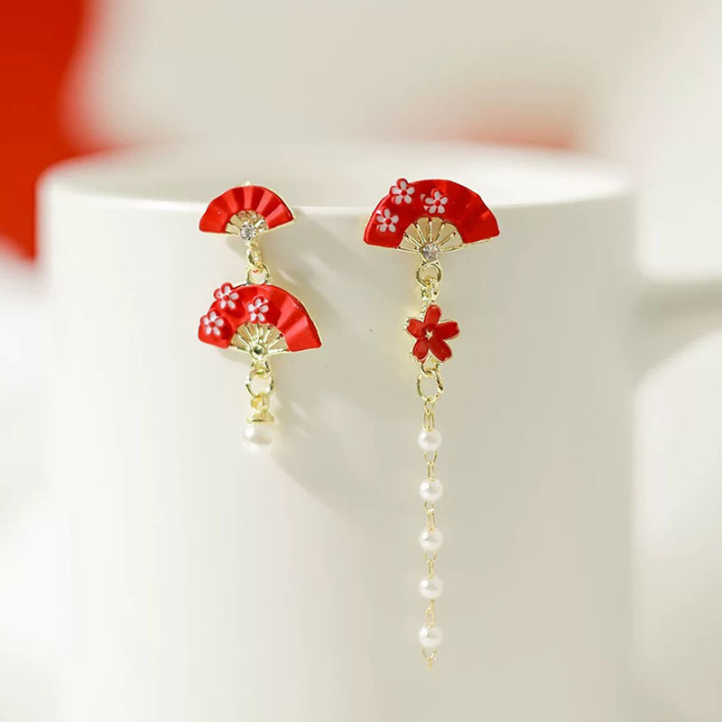 Asymmetrical red small design earrings pearl with tassels
