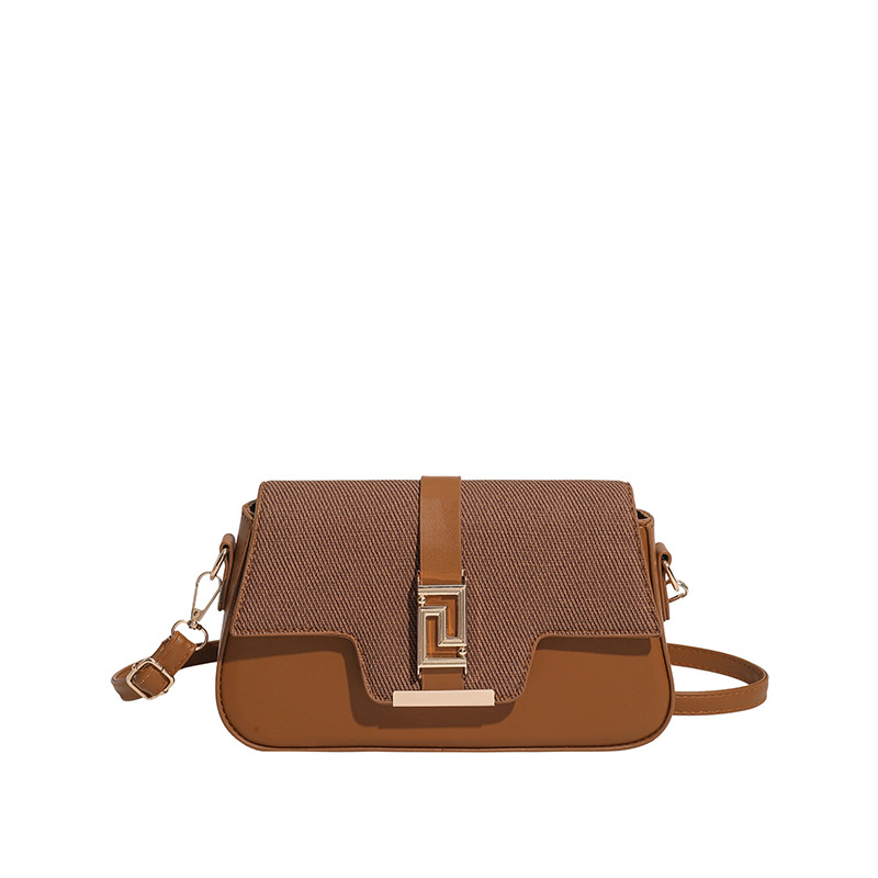 Nicho de diseño de alta sensación de silla de montar bolso para mujeres 2026 nuevo estilo coreano simple brazo de moda de hombro pequeño bolso