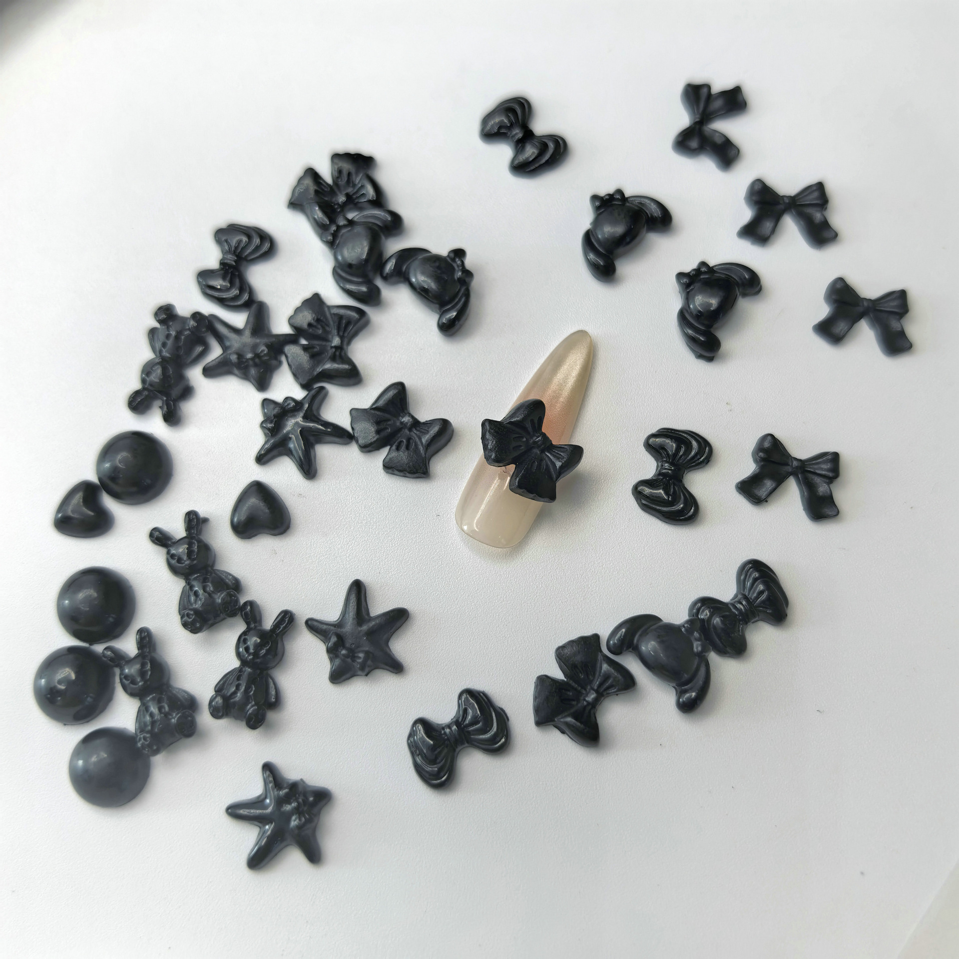 黑色系蝴蝶结桃心圆动物美甲饰品0012.jpg
