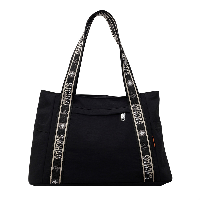 Bolso Tote portátil horizontal de tela de nailon para mujer 2025 nueva moda casual todo fósforo bolso de hombro de trabajo