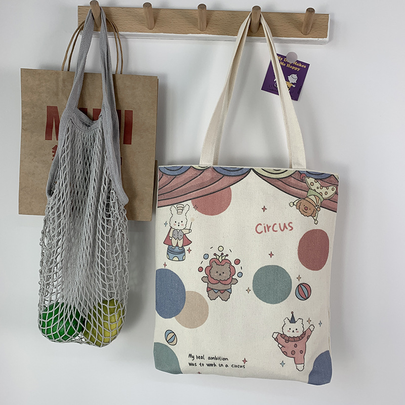 Bolsa de lona para mujer con un solo hombro estilo japonés nicho ins clase de estudiante de gran capacidad estilo coreano portátil todo partido lindo bolsa de compras