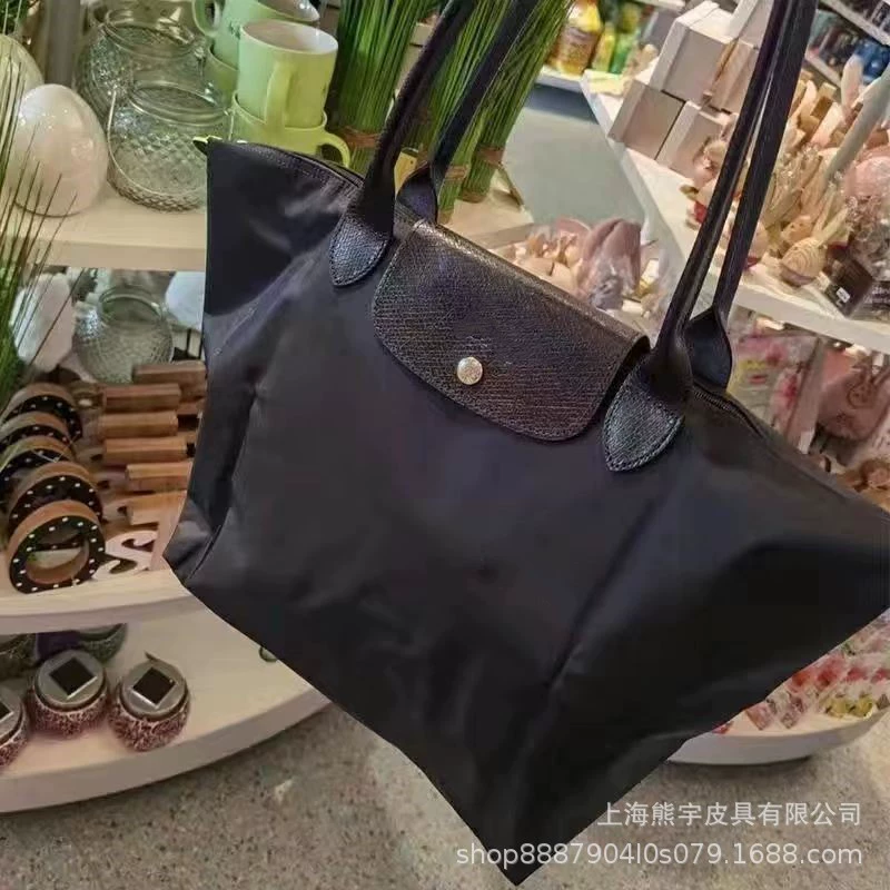 Foldable capacious purse for mother and baby, one-shoulder bag