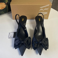 New black pointed bow decoration with low heel, shallow mouth, thin heel, exposed heel, fashionable sandals for women