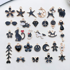 1つの黒い滴るオイルDIYの合金のアクセサリの部品のk金の滴るオイルの合金のペンダントのキーホルダーの車のペンダント