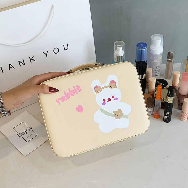 Venta directa de fábrica lindo de dibujos animados de alta apariencia caso cosmético de gran capacidad de almacenamiento de herramientas cosméticas caja portátil al por mayor