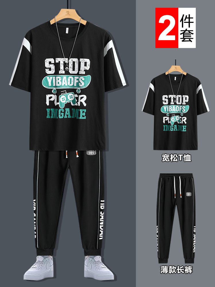 Conjunto de dos piezas de camiseta de cuello redondo holgada y deportiva informal juvenil de moda para el verano 2025 con pantalones y traje de manga corta para hombre