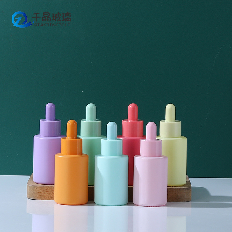 30ml botella de loción de color macaron cosméticos sub-botella de aceite esencial muestra botella de vidrio gotero de cabeza de plástico multicolor