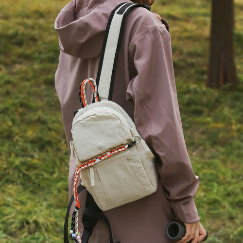 Japanese-style minimalist lightweight nylon backpack, large capacity, solid color, commuting fashion casual outdoor travel multi-purpose double shoulder bag