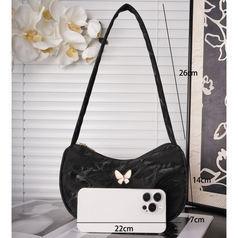 Bolsa de mariposa para mujeres 2025 verano nuevo estilo diario simple con casualidad de color sólido de hombro plegado en la parte inferior de la camisa
