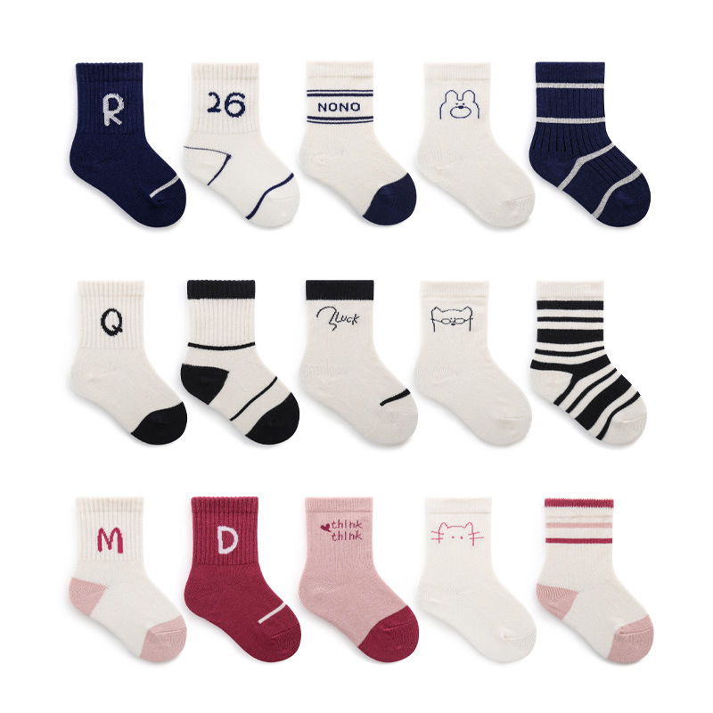 Calcetines para niños 2023 primavera nueva moda calcetines estudiante estilo universitario niños y niñas calcetines de algodón sueltos calcetines de media pantorrilla