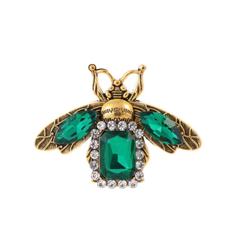 Spilla a forma di insetto con cristalli smeraldo accessorio moda_voghion.com