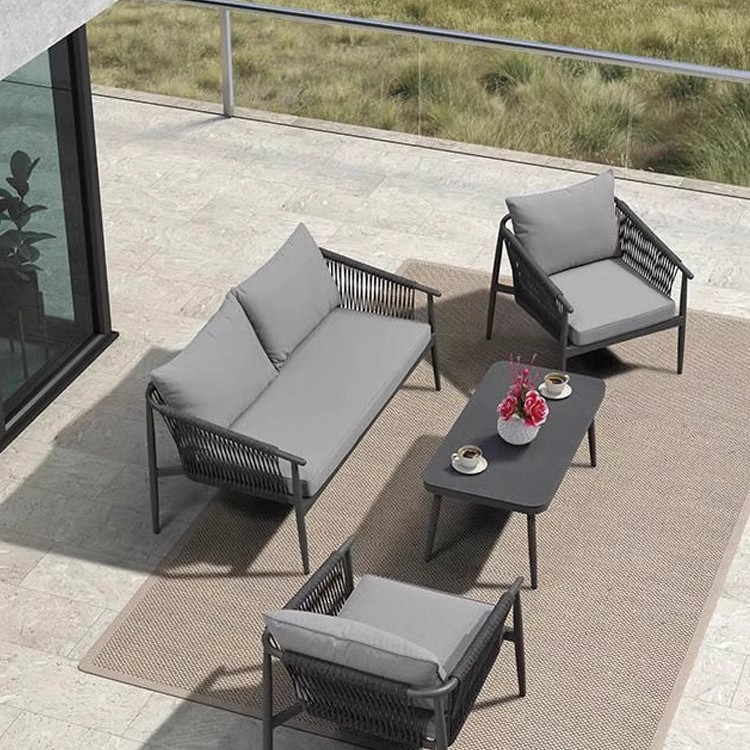 Nórdico al aire libre sofá trenzado de cuerda patio impermeable solar villa mesa de té combinación de muebles de ocio al aire libre