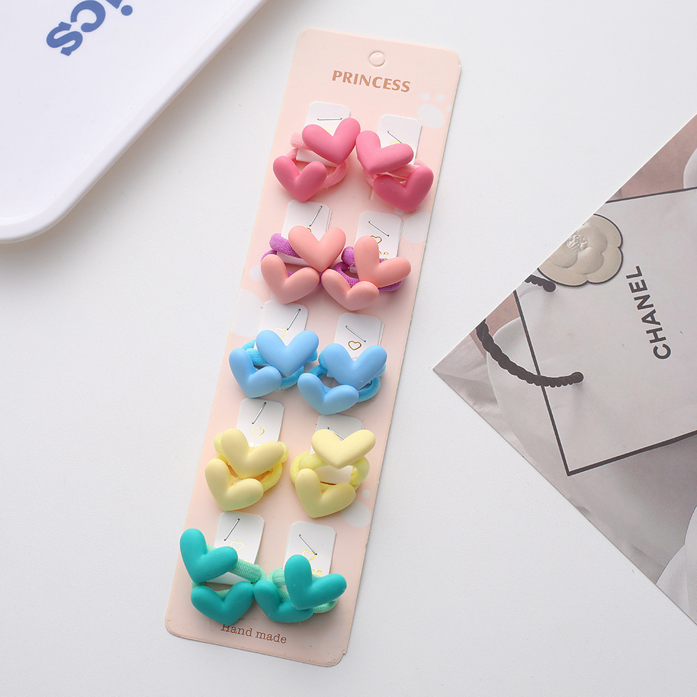 La alta elasticidad de los niños no duele la banda de goma de la cuerda del pelo del bebé de la banda linda del pelo del pulgar de la niña