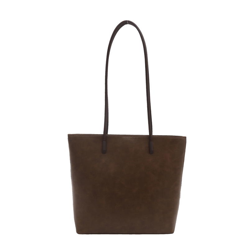 Bolsa de hombro debajo de las axilas 2025 primavera de estilo de estilo de nicho nuevo diseño minimalista estilo de viento gran capacidad bolsa de mano