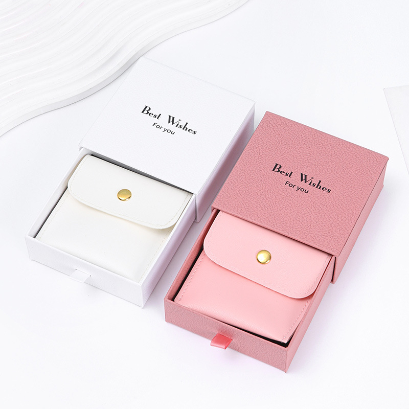 Bolsas de joyería de cuero PU nicho botón diseño collar anillo pulsera bolsa de almacenamiento antioxidante al por mayor