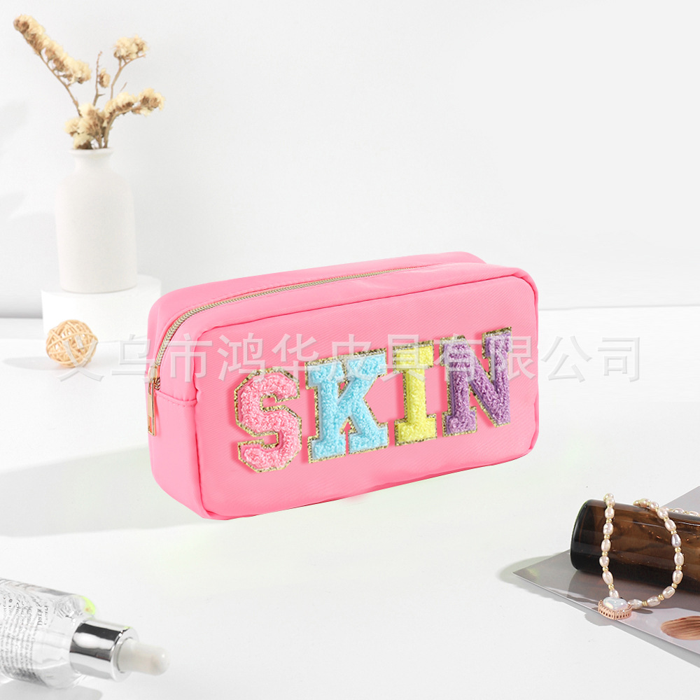 Transfronterizo amazon popular toalla bordada carta de nylon bolsa de cosméticos bolsa de almacenamiento de gran capacidad informal de las mujeres a prueba de agua