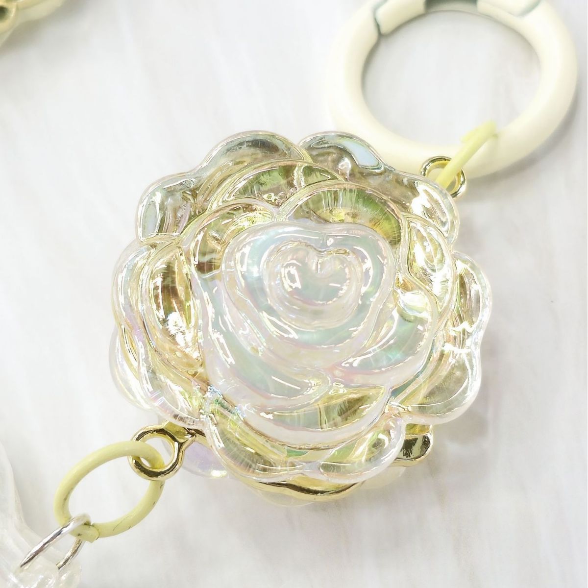 2023 nueva hoja pluma llavero colgante Cadena de teléfono móvil pequeño color fresco color sólido accesorios auricular caso bolsa colgante