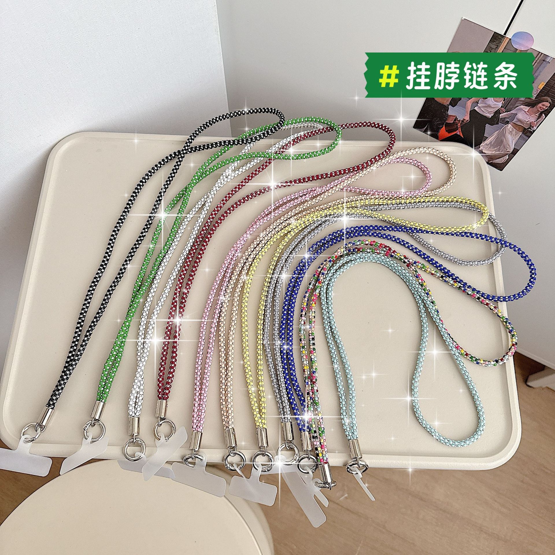 Cadena colgante de teléfono móvil de alta gama hecha a mano de boutique, sensación femenina de alta gama, lujo ligero, cadena colgante de diamante completo, cadena colgante de teléfono móvil de moda, sección larga y corta