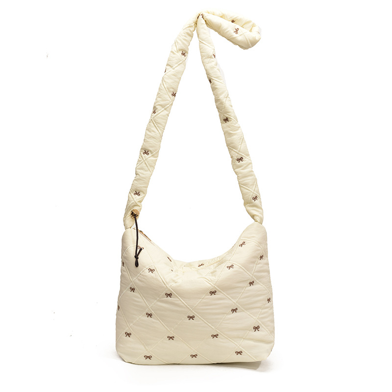 Otoño y invierno de gran capacidad para mujeres 2024 nuevo diseño de arco de bordado ligero de hombro mochila de viaje bolsa