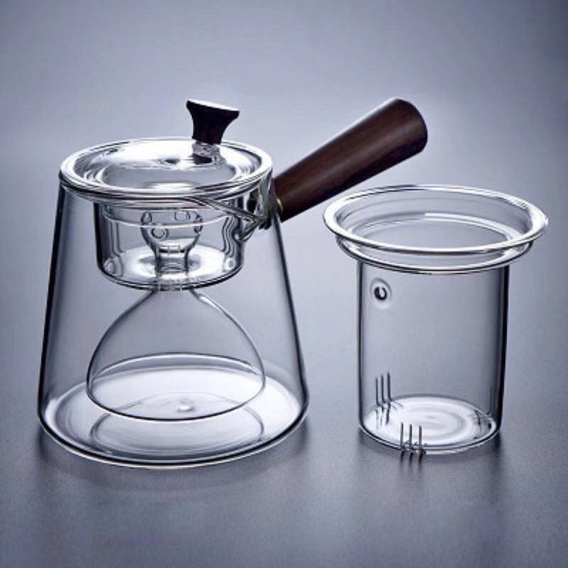 Fabricantes al por mayor lado poner la tetera de vidrio tetera con filtro de vapor tetera Puer tetera