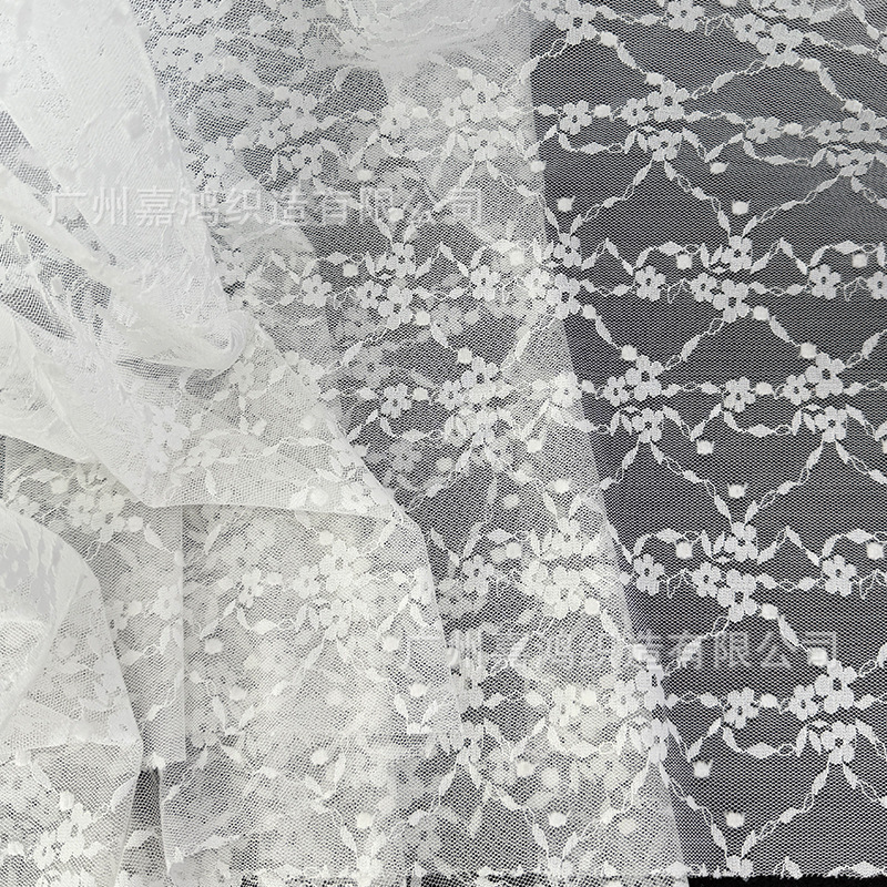 Tejido de encaje elástico jacquard tridimensional para hacer falda, vestido de perspectiva, falda elástica, albaricoque blanco y negro en stock