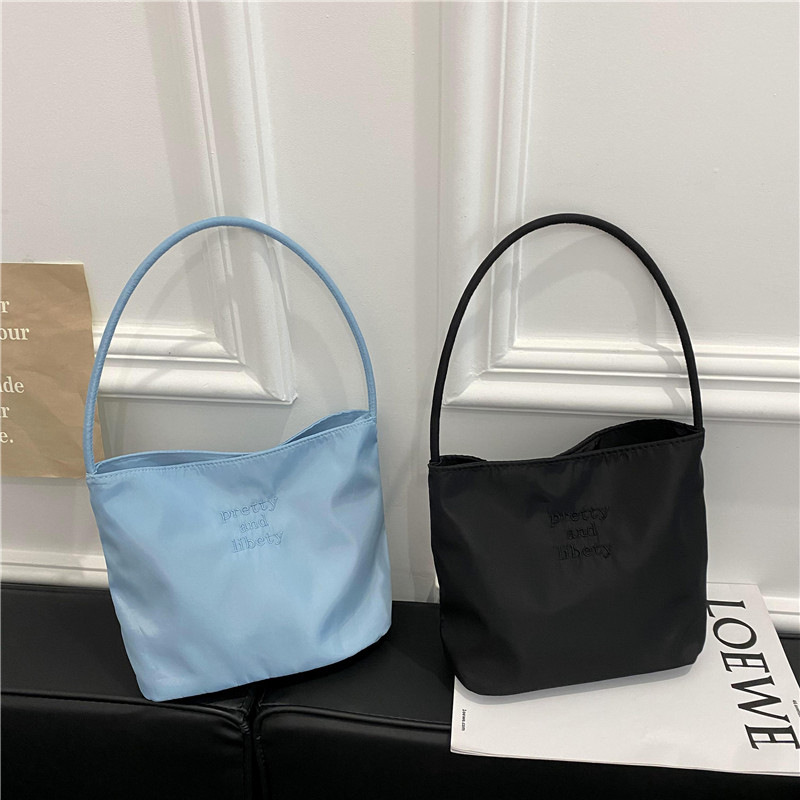 Corea del Sur mucho y eboy2023 nuevo bolso del cubo de las mujeres simple casual todo-fósforo del bolso de nylon axila
