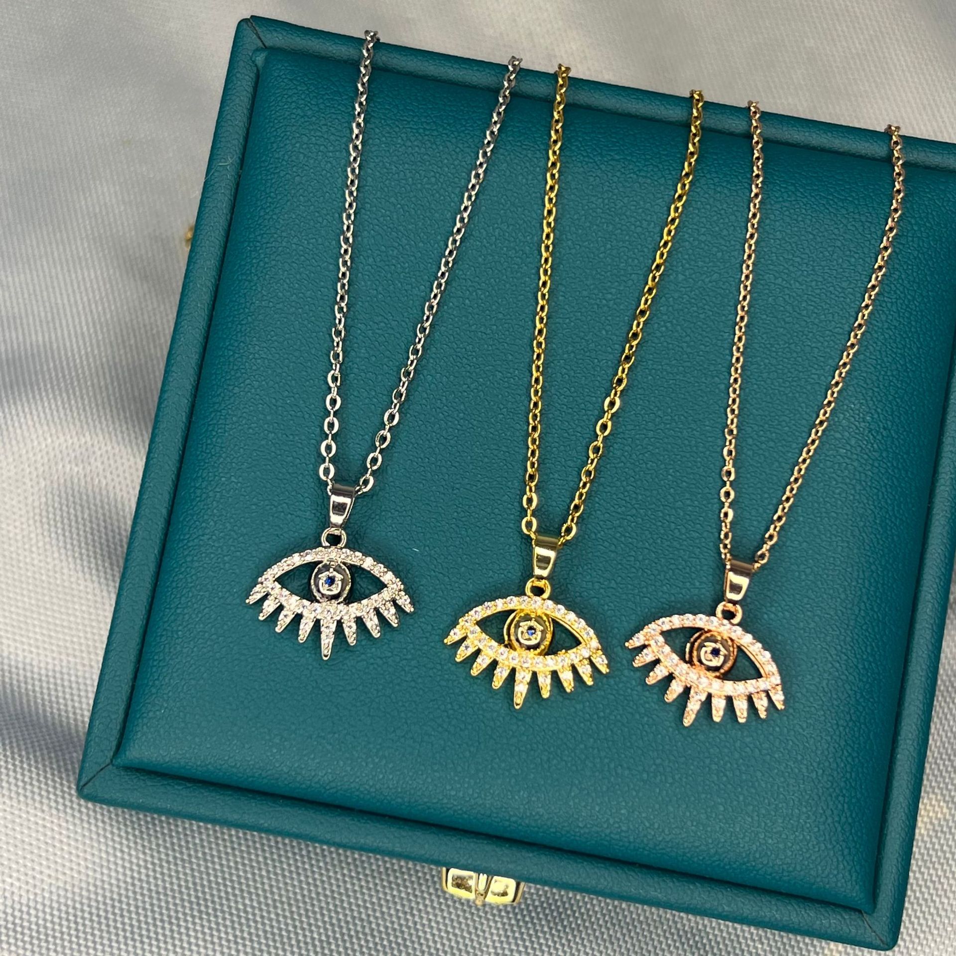 Simple Style Devilu0027S Eye Titanium Steel Inlay Rhinestones Pendant Necklace 1 Piece