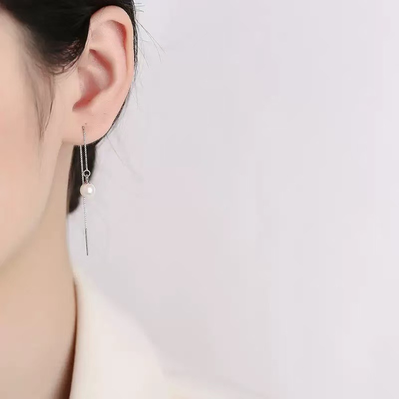 Long fashionable Korean elegant earrings from pearl with tassels