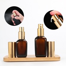 茶色方形玻璃精油瓶按压喷雾泵黑色乳液棕色避光香水喷头喷雾瓶子