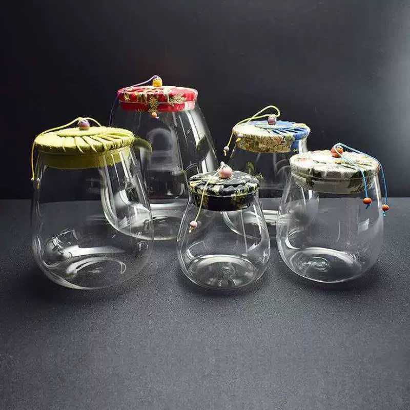批发高硼硅玻璃茶叶罐创意布盖透明密封茶叶罐花茶糖果杂粮储物罐