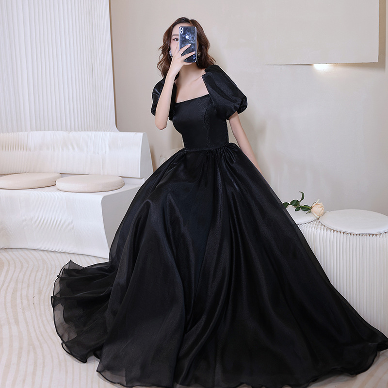 Vestido de noche negro para mujer, estilo nuevo de otoño 2025, manga abullonada, satén, para anfitriona de reunión anual, pasarela