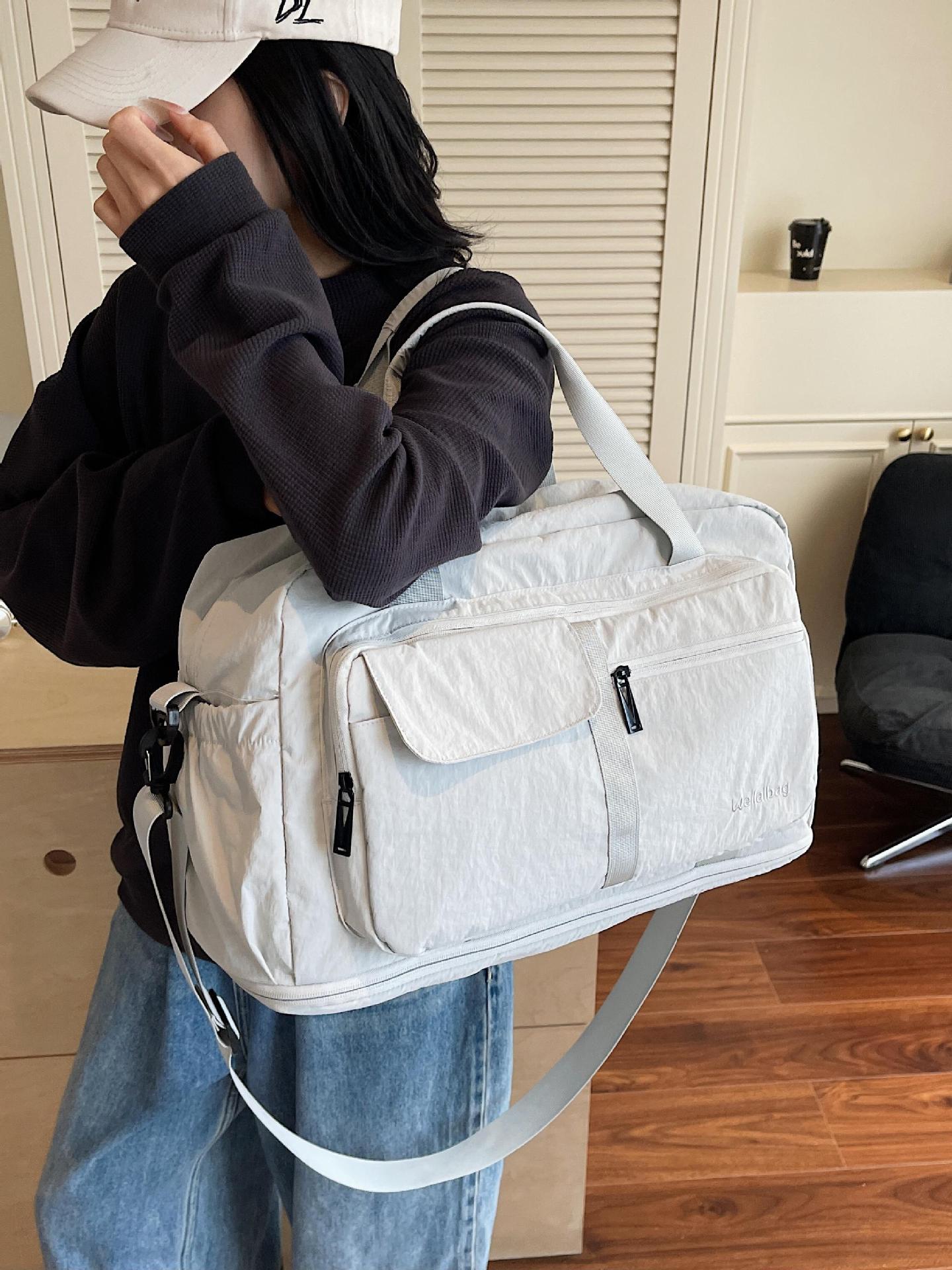 Bolsa de viaje de corta distancia portátil transfronteriza nueva bolsa de almacenamiento portátil de gran capacidad bolsa de yoga de fitness al aire libre bolsa de lona mujer