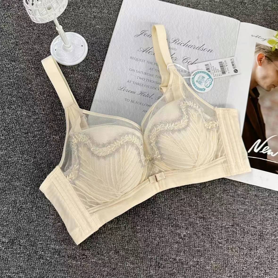 Nuevo sujetador de alta calidad de moda de encaje jacquard transpirable y cómodo ajustable anti-caída reunido tres filas de ropa interior de botón