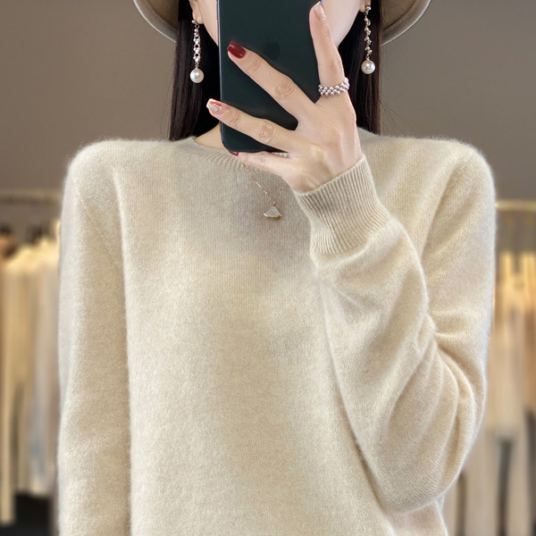Woolen knitted sweater with a round collar
