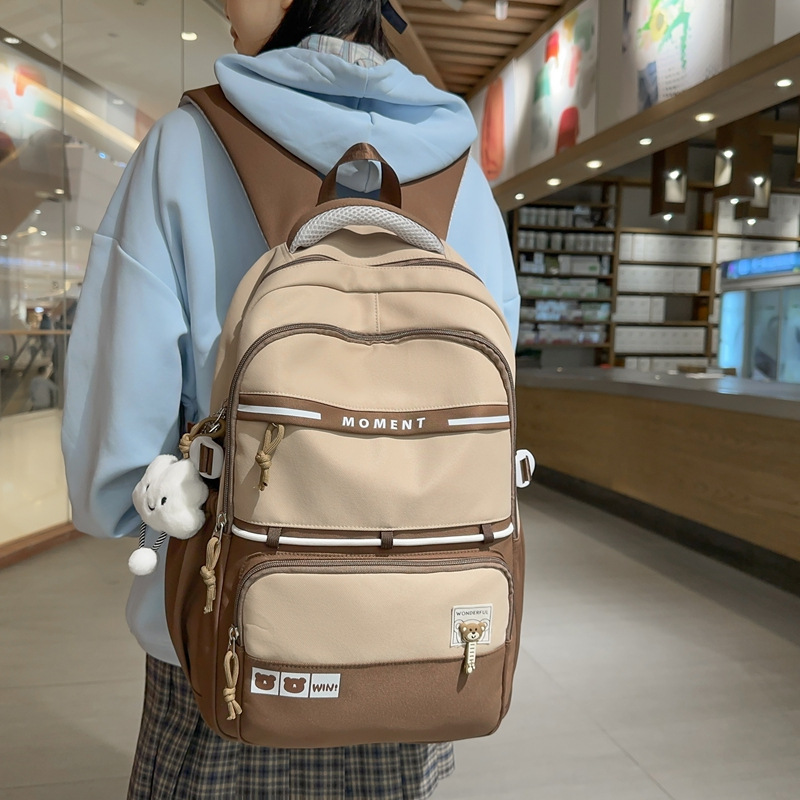 Nuevas mochilas casuales mochilas escolares transfronterizas para estudiantes de secundaria y secundaria mochilas escolares de moda para viajes al aire libre mochilas de estilo escolar