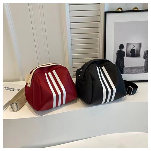 Fashionable and casual new nylon women's bag hand-held cross-body travel bag shell bag versatile sports style pillow bag