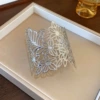 Серебристый