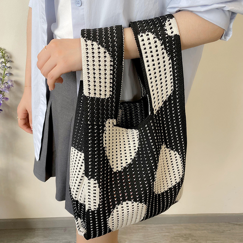 Estilo coreano nicho diseño moda hueco pequeña flor de punto bolso de mano estudiante de gran capacidad bolso de las axilas bolso de las mujeres