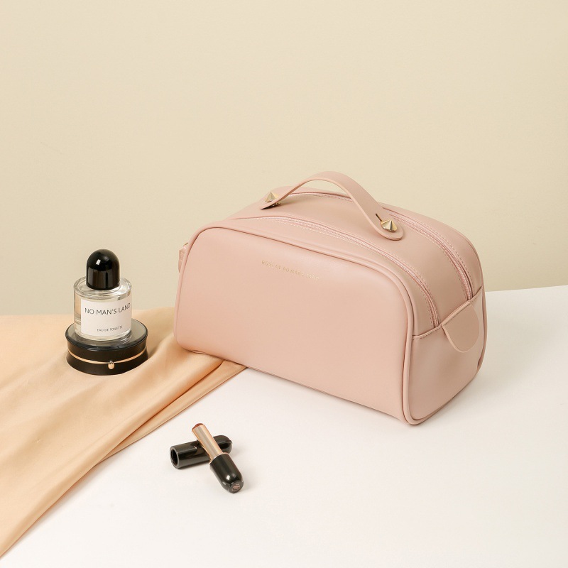 2023 Nueva celebridad de Internet PU bolsa de cosméticos de doble cremallera bolsa de lavado Portátil Bolsa de almacenamiento de cosméticos de viaje textura