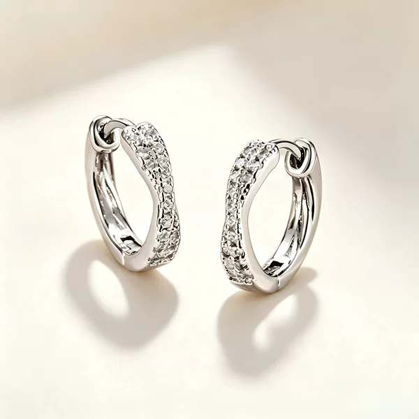 S999 silver cross-inlaid zirconia hoop earrings, a niche design with exquisite details, offering a light luxury and sophisticated look
