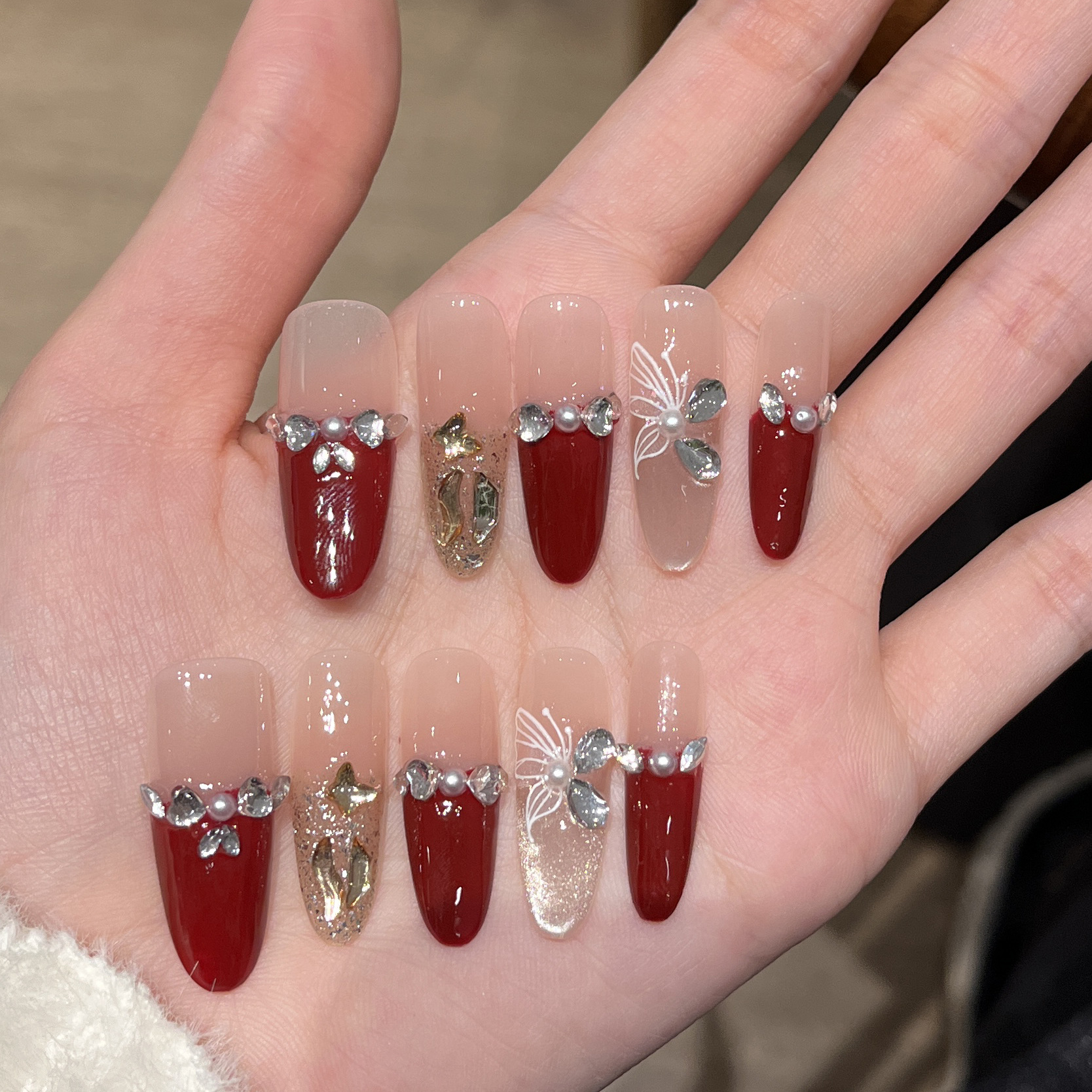 Nuevo uso manual de uñas de alto nivel de Año Nuevo francés mariposa roja manicure pieza de uñas terminada manicura falsa desmontable