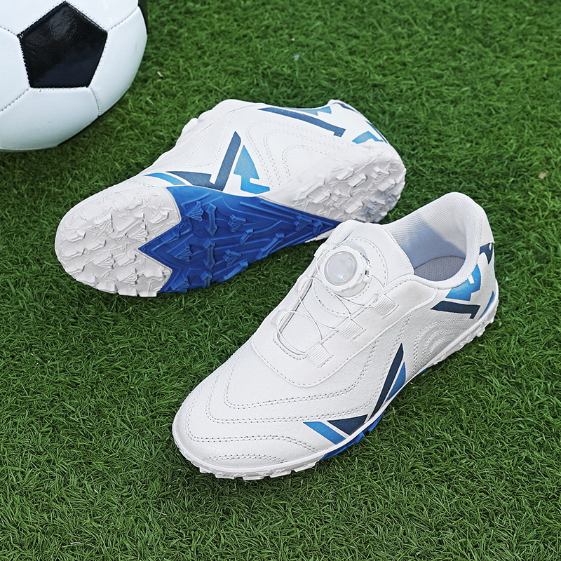 Baochuan nuevo zapato de fútbol transpirable para niños botón giratorio para niños TF clavos rotos zapatos de entrenamiento de fútbol transfronterizos