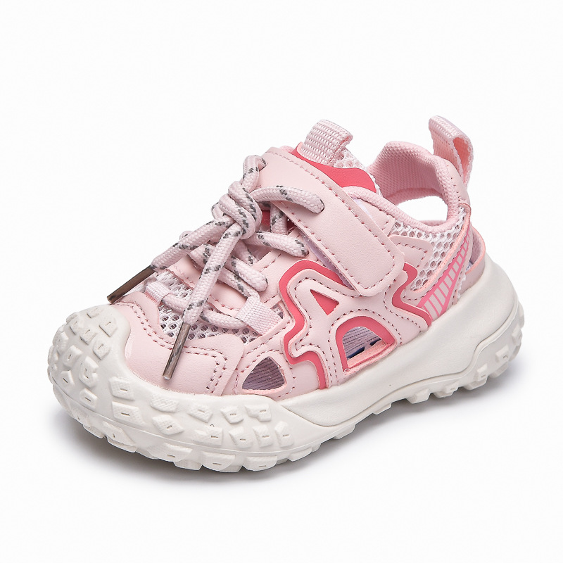 Verano 2025 nuevo estilo sandalias para niños con suela de neumáticos zapatos con marco deportivo hueco Baotou para niños pequeños y medianos zapatos de playa de suela suave