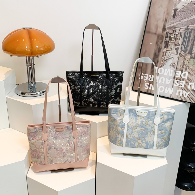 2024 nuevo estilo de verano casual estilo de impresión casual simple textura de gran capacidad de mujer bolso de mano de mujer