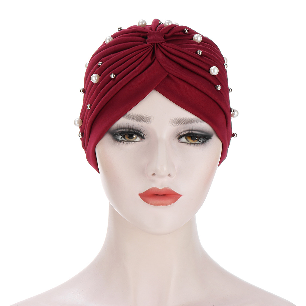 Women's Fashion Solid Color Pearl Eaveless Beanie Hat display picture 1